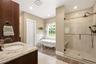 2 sinks, glass enclosed shower