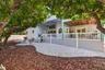 Large enough to add a pool, or enjoy this low maintenance yard just as it is