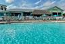 The Island Grille and Raw Bar. This serves as a community pool; for $7 you can purchase a wrist band at the Tiki Bar and enjoy food, drinks, live musi