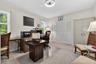 Spacious third bedroom currently serves as a home office