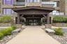 Beautifully maintained building exterior showcasing the properties exceptional curb appeal and welcoming presence.