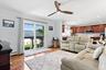 Large Den off of Kitchen with sliders to beautiful back yard,