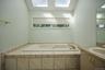 Enjoy bathing in the Jacuzzi tub with two new skylights above
