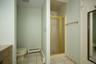 Toilet area and Stall Shower