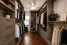 This is a bedroom used as a walk-in closet.