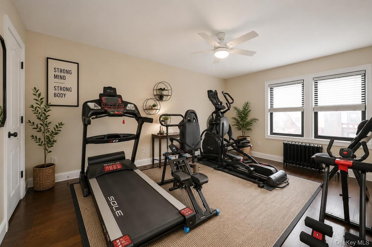 This is the second bedroom which is currently being used as a gym.