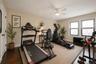 This is the second bedroom which is currently being used as a gym.