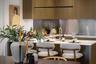 Bespoke kitchen with composite stone worktops and island in a Pavilion apartment, Sunningdale Park