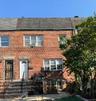Brick exterior with partial shingle roofing