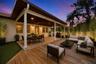 Virtually Staged to show potential of the outdoor area. Plant, pots and landscape lights are all digital.