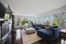 Walls of glass, door to deck, fireplace and spectacular views