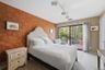 Second bedroom with sliding doors to private deck and beautiful views