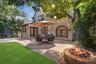 Enjoy seamless indoor-outdoor living with an expansive patio just off the kitchen, ideal for summer entertaining.
