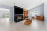 family room with fireplace and built in shelves