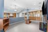 another view of family room with built in cabinets