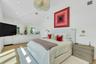 Primary Bedroom with Vaulted ceiling with recessed lighting and contemporary chandelier