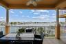 Generous patio spans the main living areas and primary bedroom