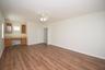 Upstairs family room with desk and balcony.