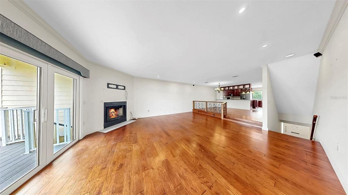 Living Room with Wood-Burning Fireplace