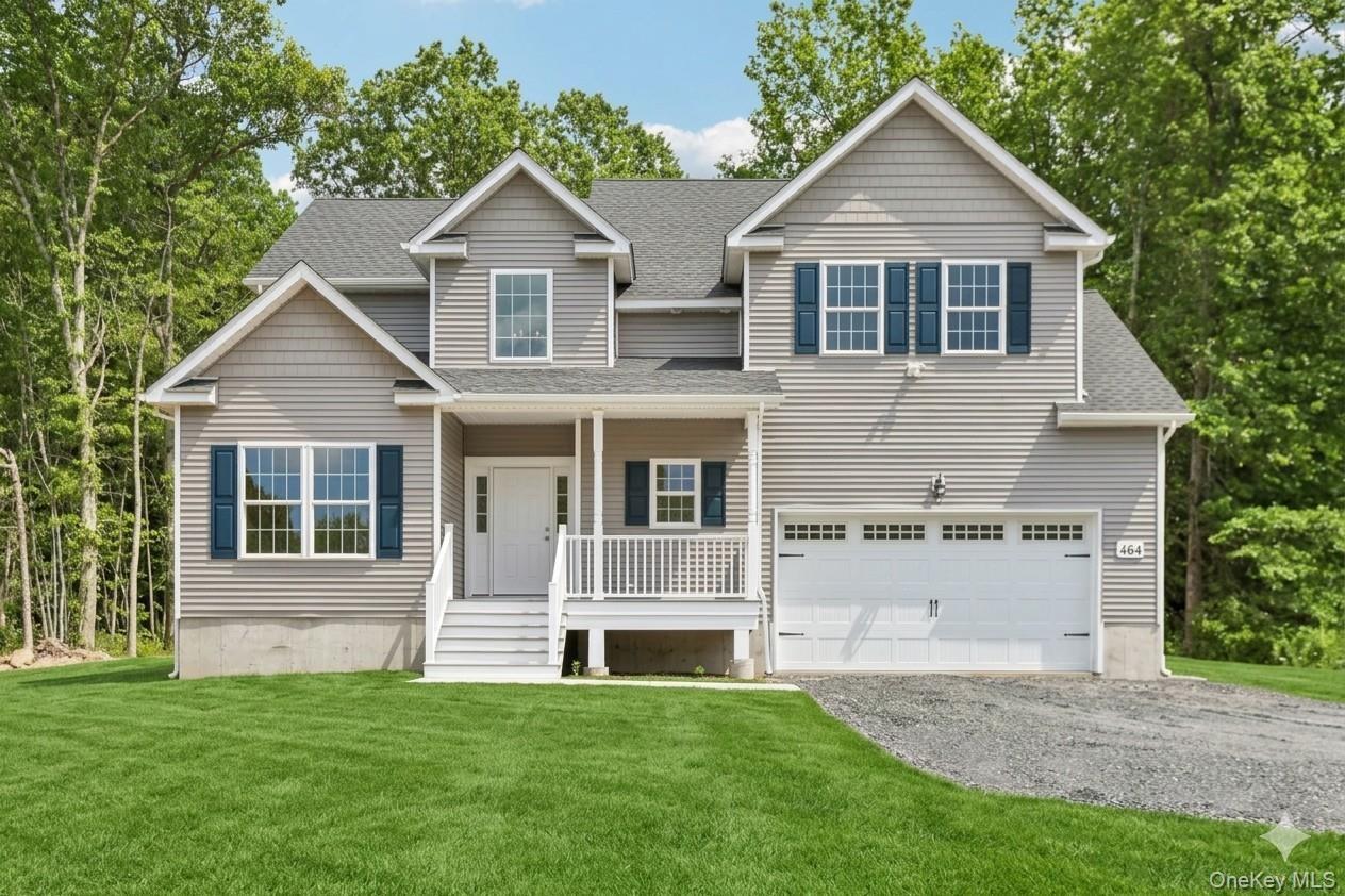 Beautiful colonial home.  Lawn is an AI-generated rendering.