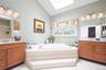Master suite spa bath w/ his & hers vanities