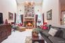 Family room w/ soaring stone gas fired fireplace