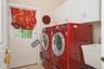 Laundry Room w/ slop sink & access to driveway