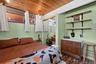 Wood-paneled ceiling with exposed beams