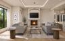 Grand family room with gas fireplace insert and custom accents throughout