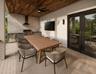Artisan styled outdoor kitchen with tounge and groove ceiling on the lanai