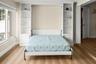 Directly facing open Murphy bed.