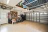 Garage interior facing closed garage door.