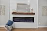 Shiplap accent wall featuring a linear electric fireplace with a wood mantel