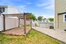 Perfect for relaxing in your Outdoor living area featuring a pergola with a fabric canopy, a paver patio, and a privacy fence