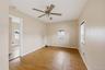 Freshly Painted Living room with view of the 1st floor bedroom
