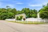 White picket fence around the corner of 14 Nevada Road