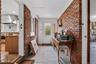 Covered vestibule from house to garage.