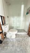 Ensuite bathroom to street side bedroom.  Bathrooms were remodeled prior to the storm.
