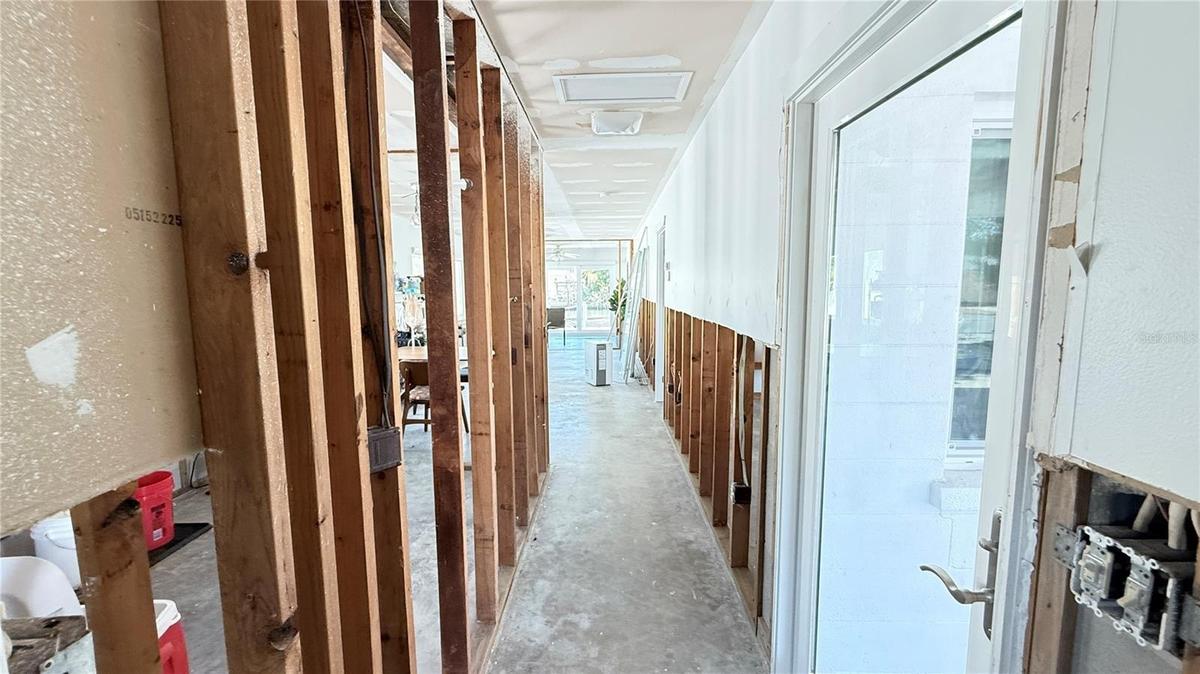 Main entry looking down hallway towards living area