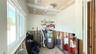 Laundry/storage room located in the front of the unit.