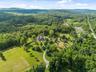 A bird's-eye view of this private country retreat nestled in the Hudson Valley.