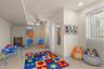 Currently used as a playroom, this versatile lower-level space offers wall-to-wall carpeting, an expansive storage closet, and endless possibilities f