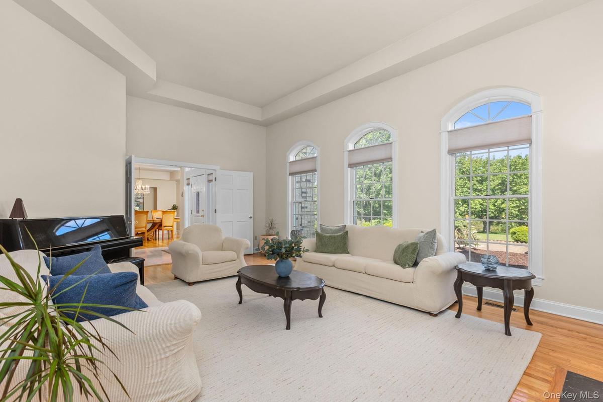 Sophisticated living room featuring timeless style and abundant natural light.