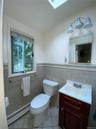 Bathroom #2 with skylight in primary bedroom suite
