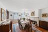 Gracious dining room with fireplace