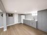 Virtually enhanced photo. Personal property and clutter have been digitally removed. Room dimensions and permanent features remain unchanged.