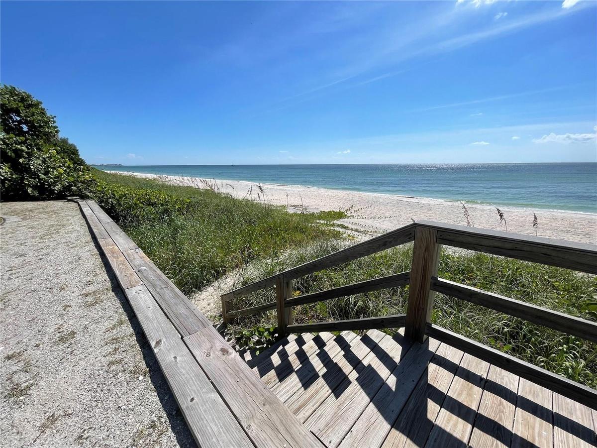 Steps facing south.  Nokomis public beach is a 3 mile walk south.