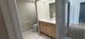 Gentleman's bath has a large shower.