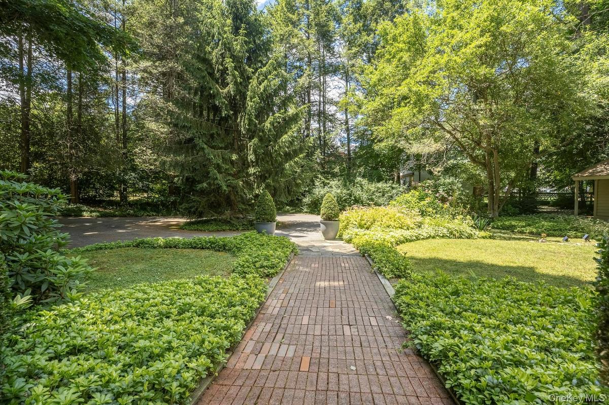 Wonderful & elegant "Secret Garden" like paths lead to so many beautiful parts of the property