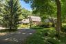 The view as you approach the home and circular driveway